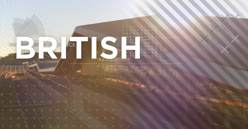 Video still of Silverstone Wing architecture and circuit track under a golden sunset with graphic overlays.